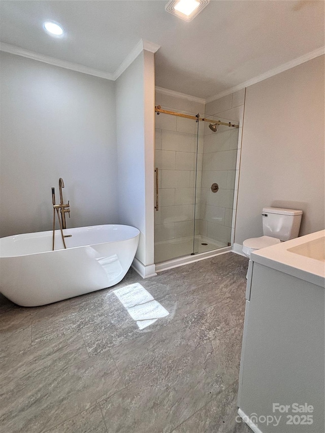 bathroom with toilet, vanity, ornamental molding, a soaking tub, and a stall shower