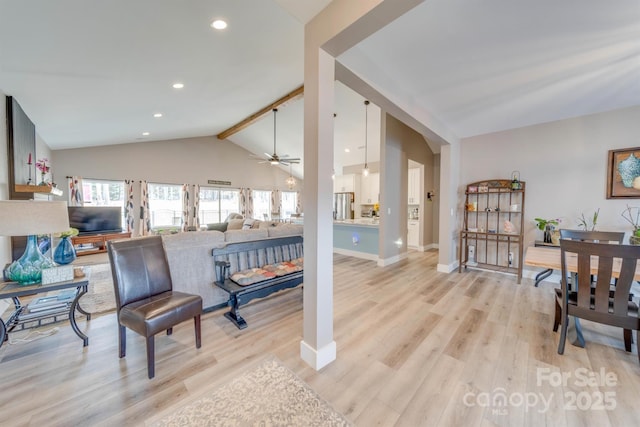 living area with vaulted ceiling with beams, light wood finished floors, recessed lighting, a ceiling fan, and baseboards