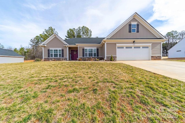 view of front of house with a garage, stone siding, concrete driveway, a front lawn, and board and batten siding