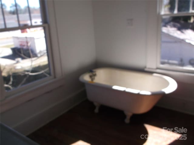 full bath with a soaking tub