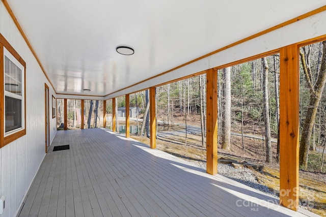 unfurnished sunroom with a healthy amount of sunlight