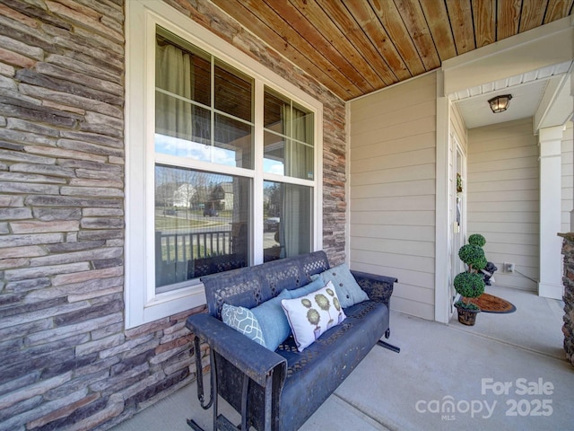 view of patio featuring a porch