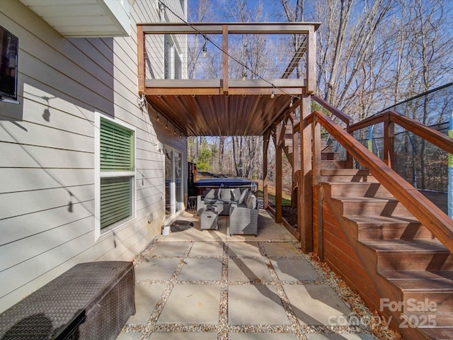 view of patio featuring stairway