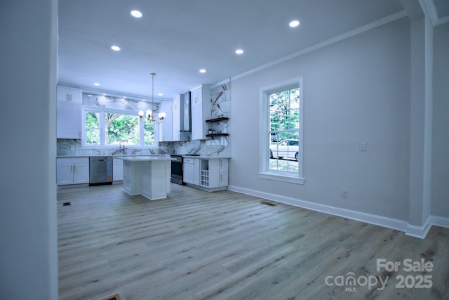 kitchen with stainless steel dishwasher, recessed lighting, and a wealth of natural light