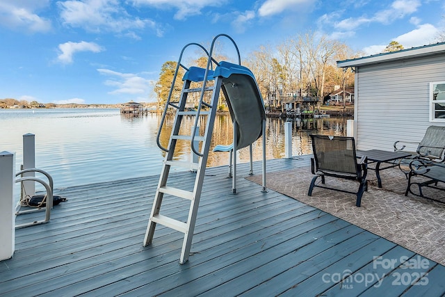 deck with a boat dock and a water view