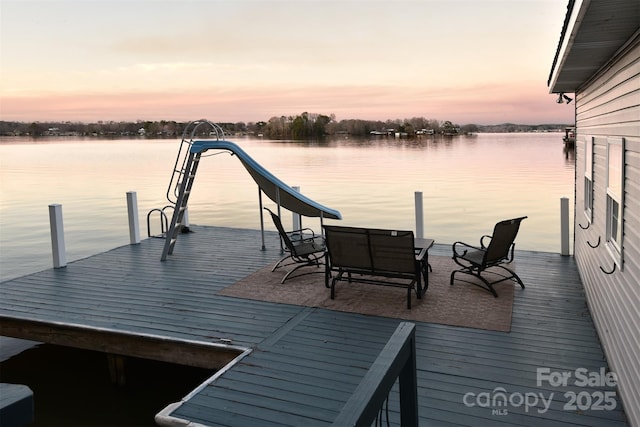 dock area with a water view