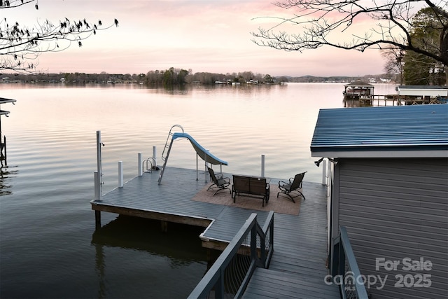 dock area featuring a water view