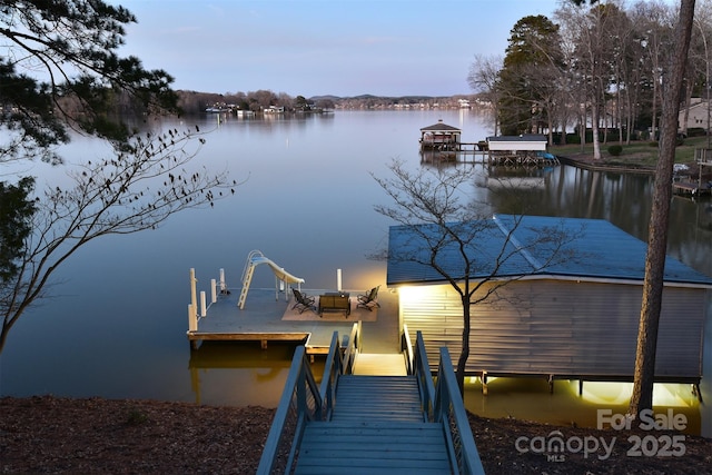 view of dock with a water view