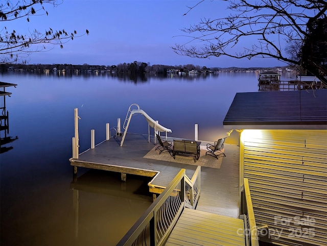 view of dock with a water view