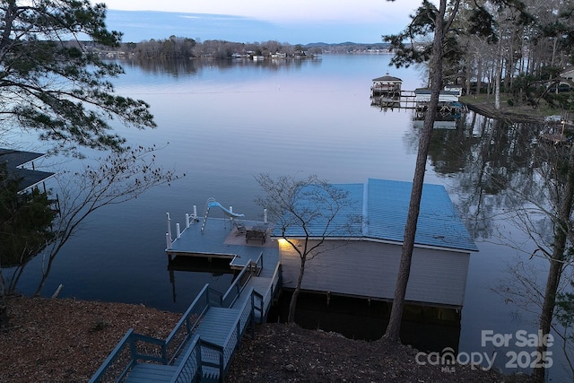 dock area featuring a water view