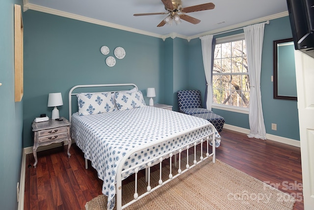 bedroom with baseboards, ornamental molding, and wood finished floors