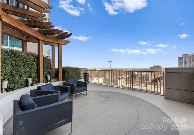 view of patio / terrace with an outdoor living space and a pergola