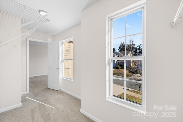 interior space featuring carpet floors and visible vents