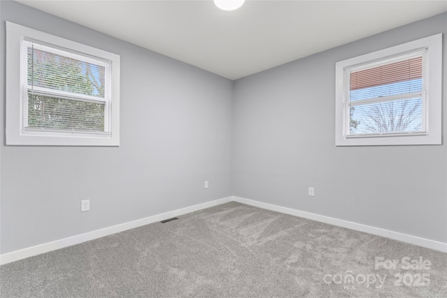 5329 Southampton Rd, Charlotte, NC 28217 - carpeted spare room featuring visible vents and baseboards