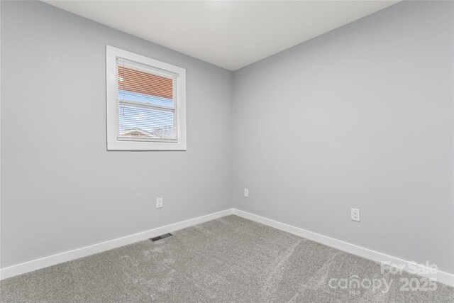 5329 Southampton Rd, Charlotte, NC 28217 - empty room featuring carpet, visible vents, and baseboards
