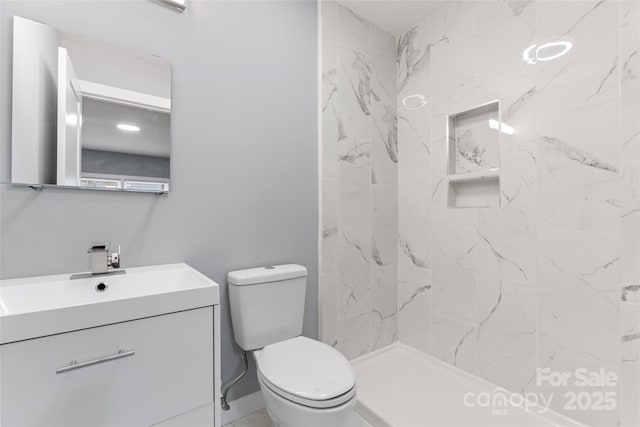 5329 Southampton Rd, Charlotte, NC 28217 - full bath featuring a shower stall, vanity, and toilet