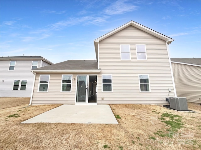 back of property featuring a patio and central air condition unit