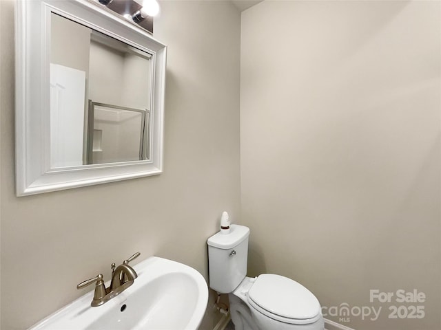 bathroom with a sink and toilet