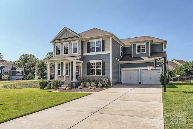 view of front of property featuring board and batten siding, a front lawn, driveway, and a garage