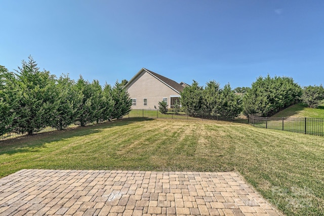 view of yard featuring a fenced backyard and a patio