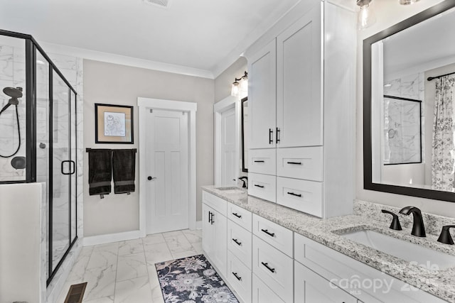 bathroom featuring a shower stall, marble finish floor, a sink, and crown molding