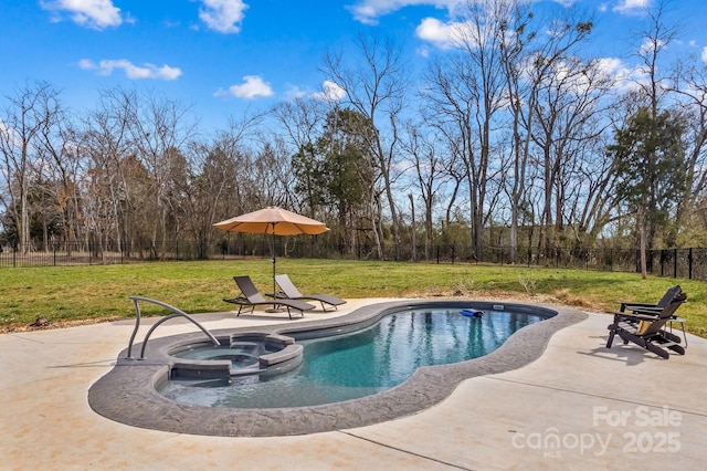 view of pool featuring a yard, a patio, a fenced backyard, and a pool with connected hot tub