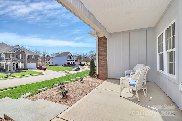 view of patio with a residential view