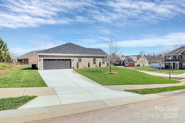 view of front of house featuring a garage, driveway, a residential view, a front lawn, and brick siding