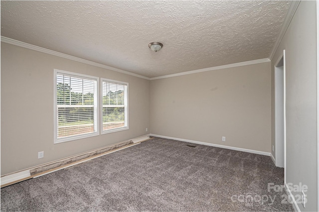 carpeted empty room with a textured ceiling, baseboards, and crown molding