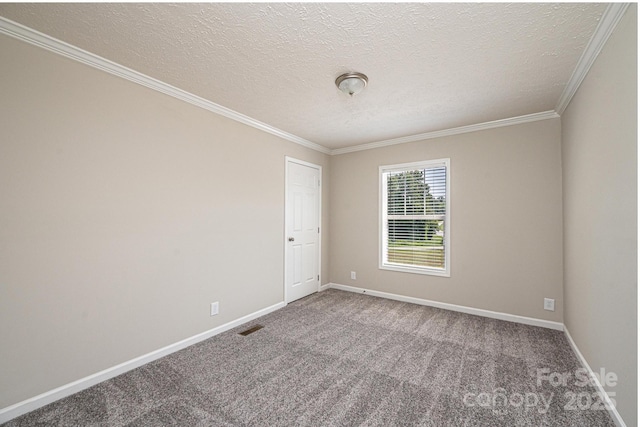 carpeted empty room featuring visible vents, baseboards, a textured ceiling, and ornamental molding