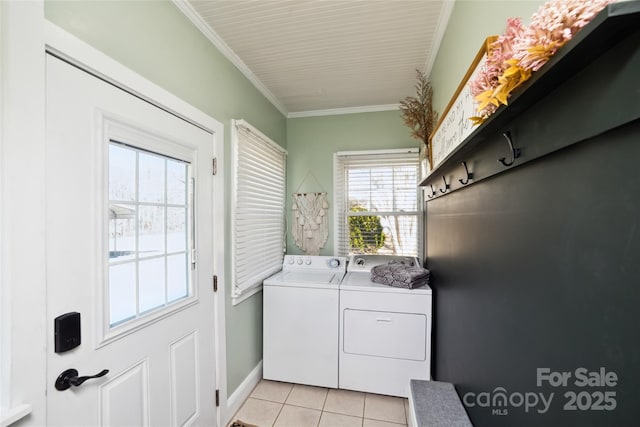 laundry room with laundry area, light tile patterned floors, crown molding, and independent washer and dryer