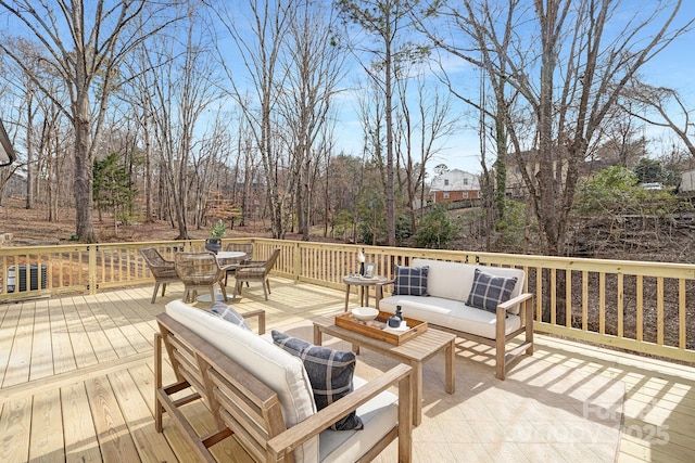 deck featuring an outdoor living space