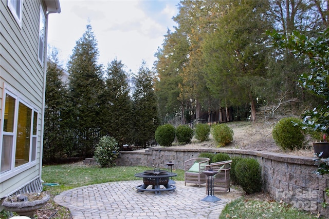 view of patio / terrace featuring a fire pit