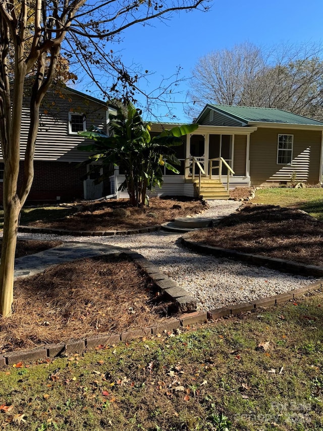 view of front facade featuring covered porch