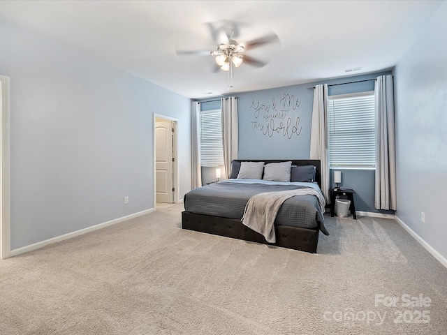 bedroom featuring carpet, baseboards, and a ceiling fan