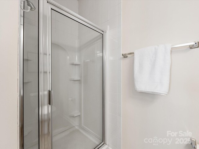 bathroom featuring a stall shower