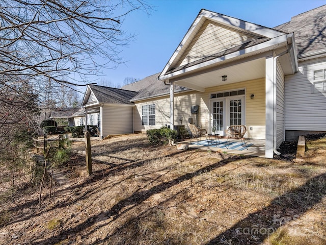 back of property featuring a patio area