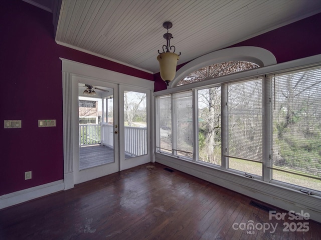 unfurnished sunroom with a wealth of natural light, french doors, and visible vents