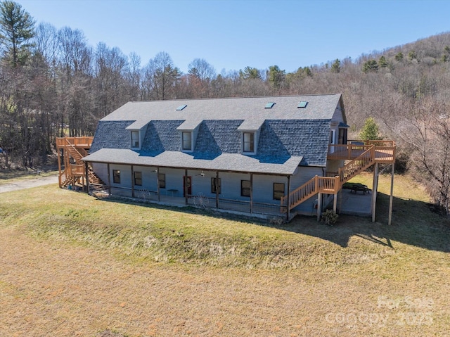 exterior space with a wooded view