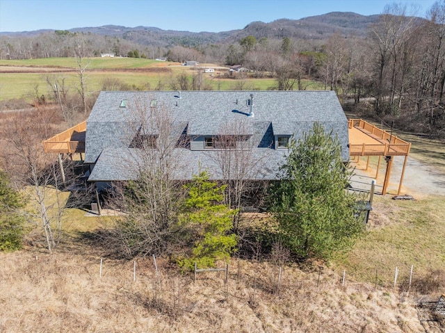 birds eye view of property with a rural view and a mountain view