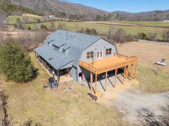 aerial view featuring a rural view and a mountain view