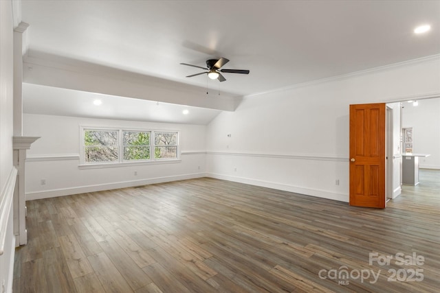 unfurnished living room with vaulted ceiling, wood finished floors, a ceiling fan, and baseboards