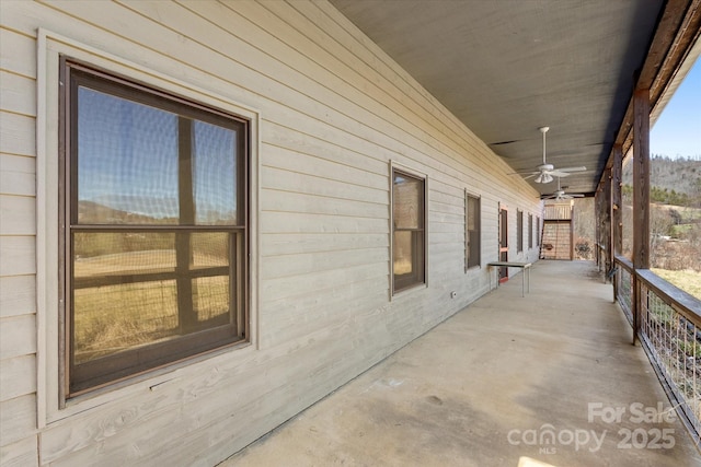 view of home's exterior with ceiling fan