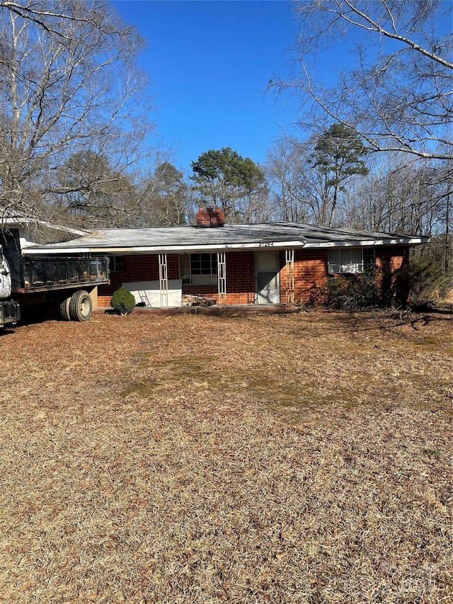 exterior space with brick siding