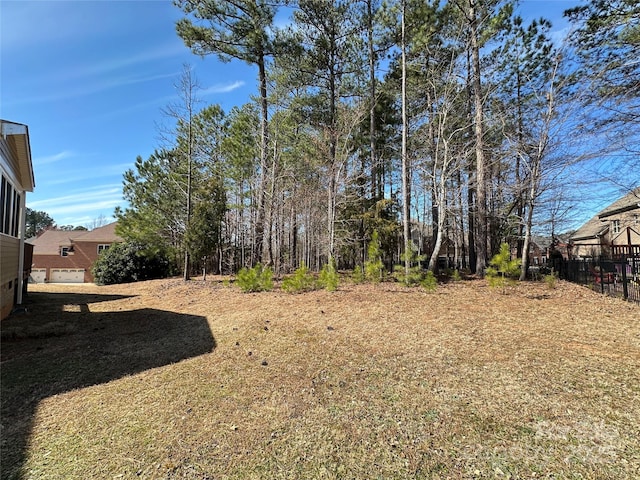 view of yard with fence