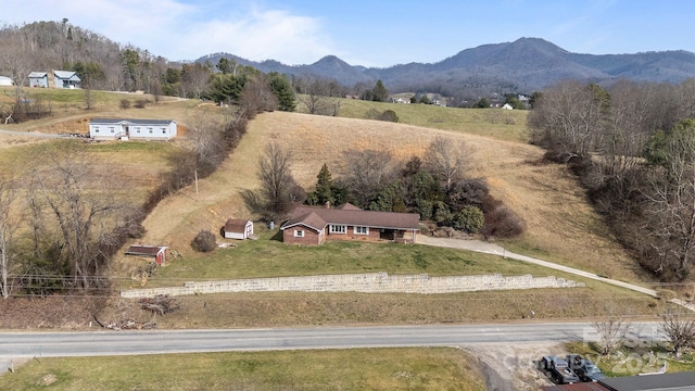 bird's eye view with a rural view and a mountain view