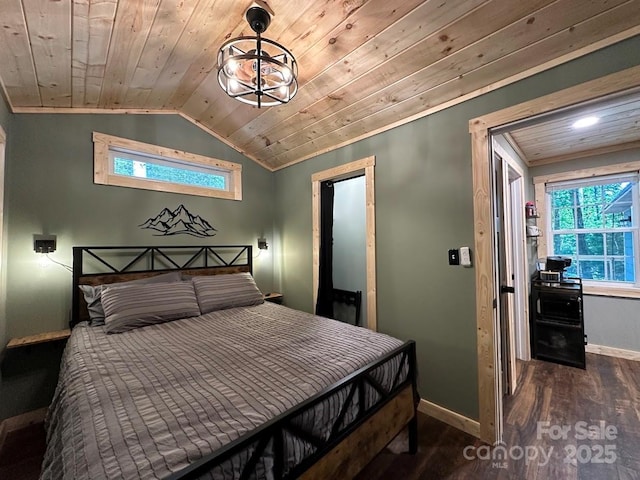 bedroom with lofted ceiling, wood ceiling, multiple windows, and baseboards