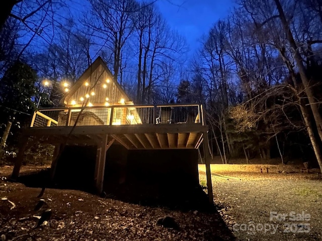 exterior space featuring a wooden deck