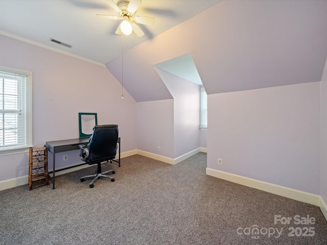 office area featuring visible vents, baseboards, a ceiling fan, carpet, and vaulted ceiling