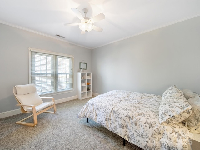 bedroom featuring visible vents, baseboards, a ceiling fan, ornamental molding, and carpet